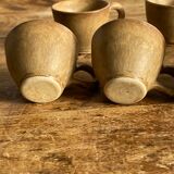 7 very small old sandstone coffee cups