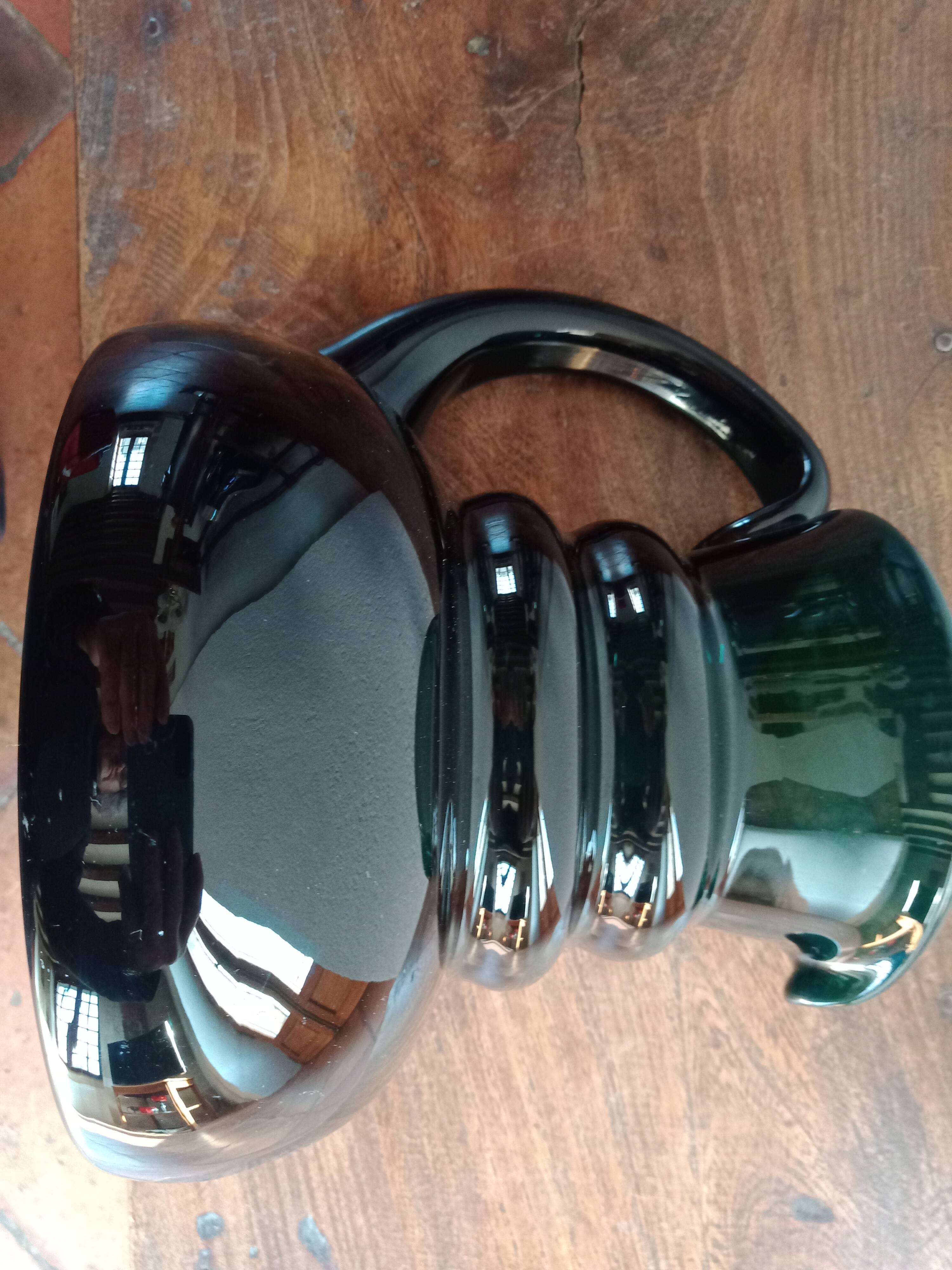 Deep green jug or pitcher with modern design - thick glass
