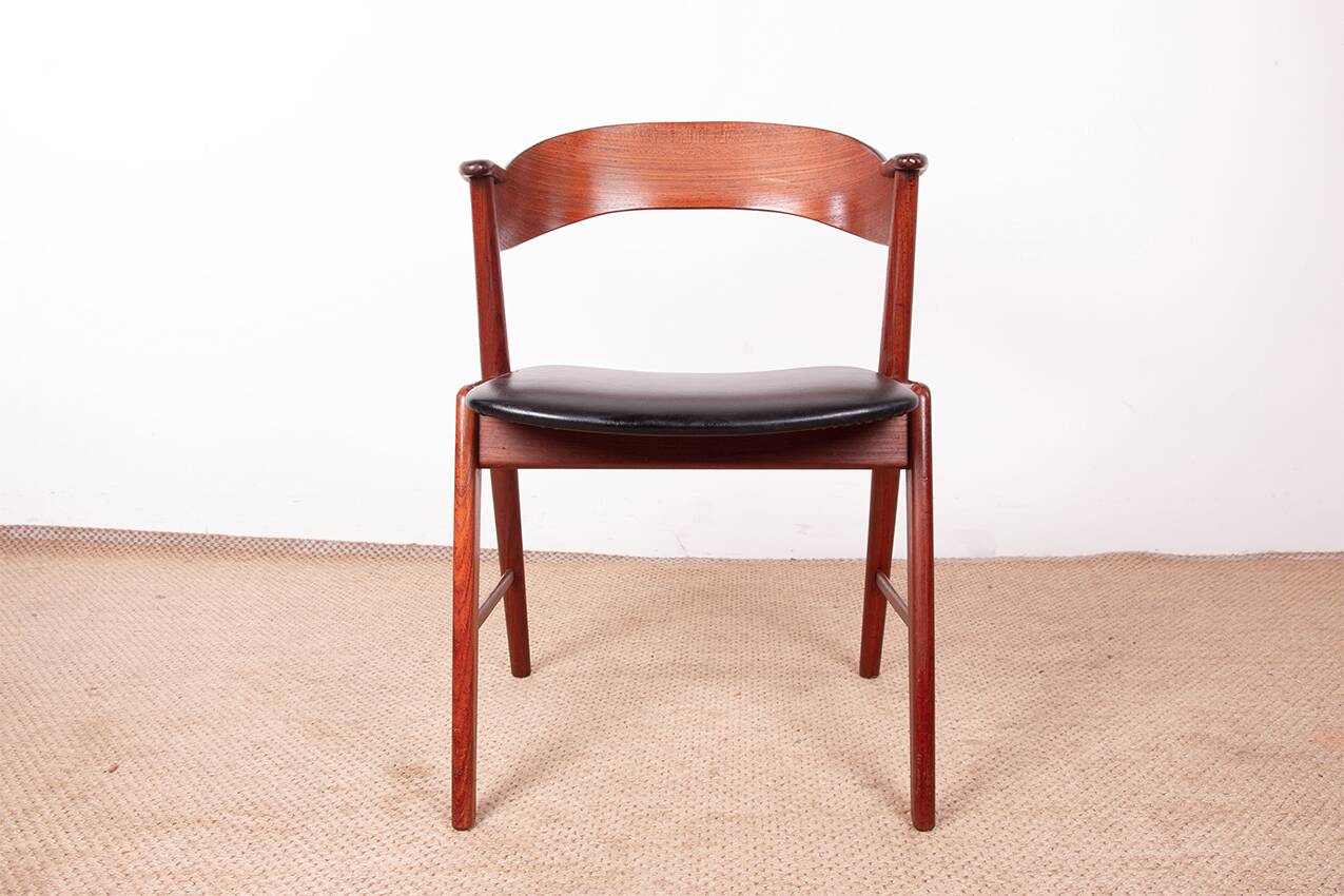 Danish armchair in teak and Skai, by Henning Kjaernulf for Korup Stolefabr.