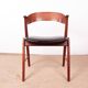 Danish armchair in teak and Skai, by Henning Kjaernulf for Korup Stolefabr.