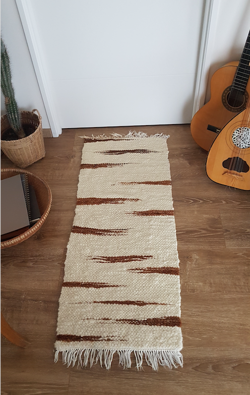 Vintage wool atisanal carpet