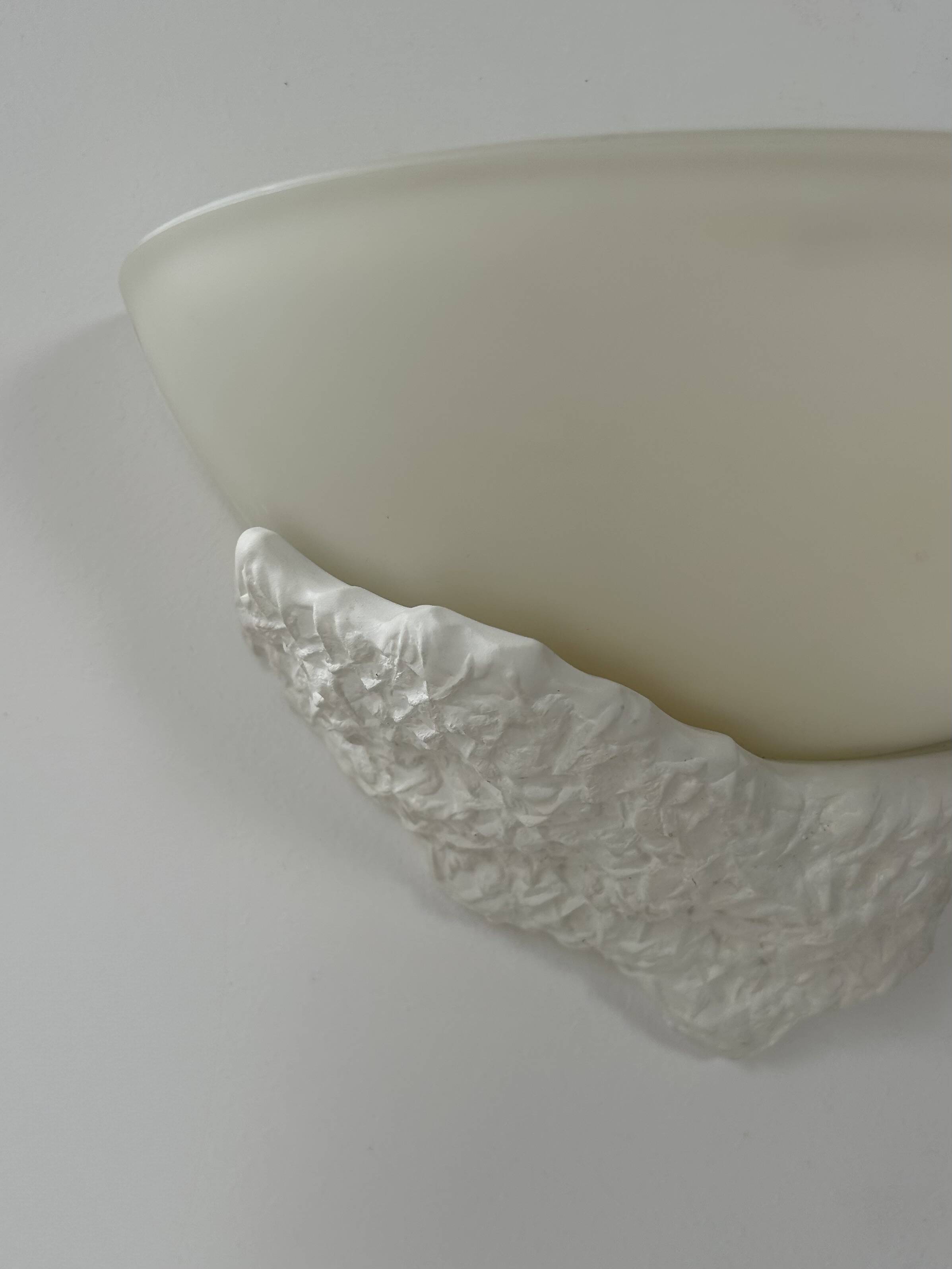 Pair of plaster and frosted glass wall lights, France, 1970.