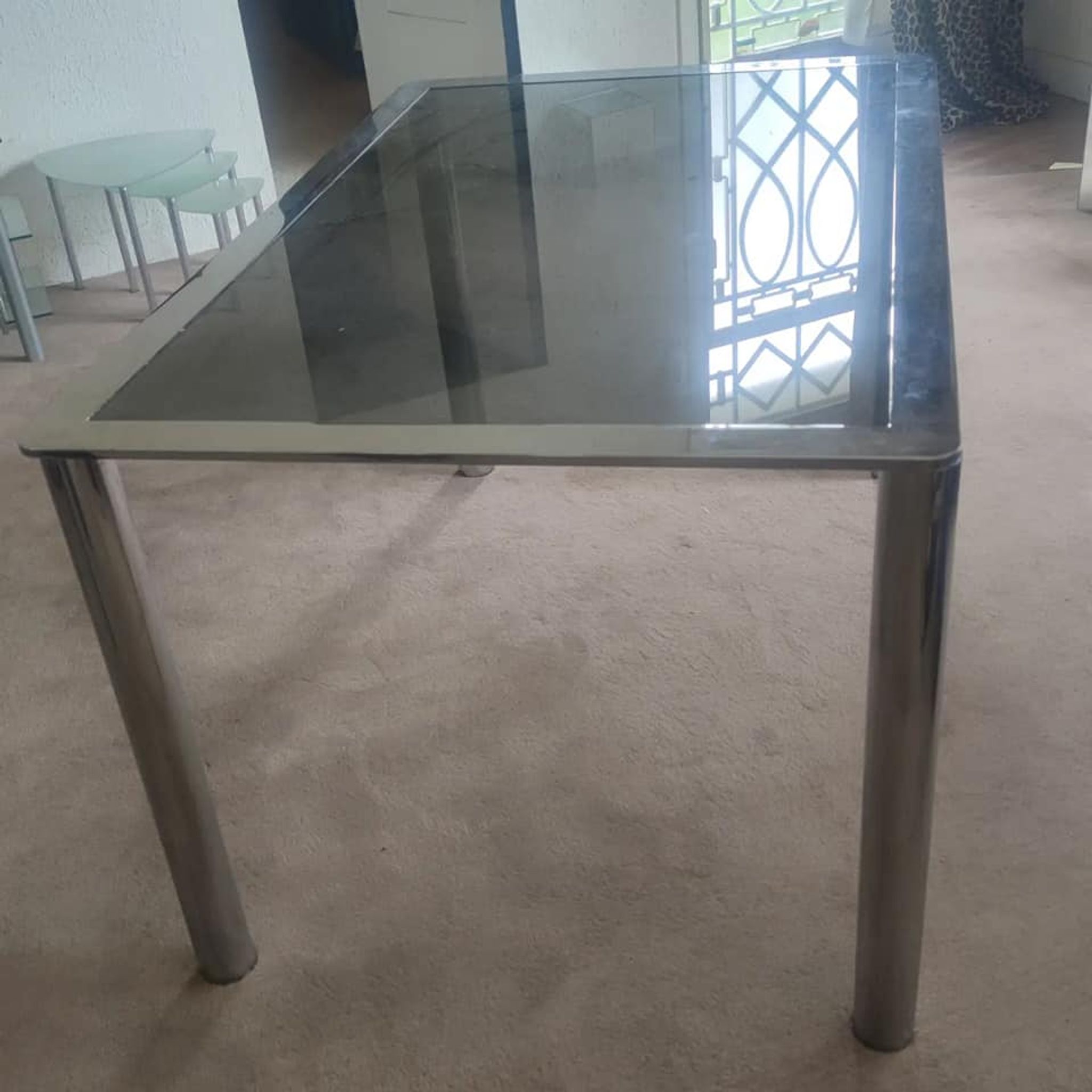 Dining table in chromed steel and smoked glass top, 1969
