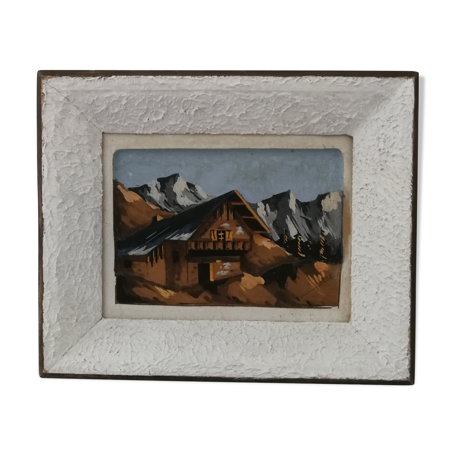 Cadre d'un chalet à la montagne en relief