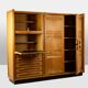 Guillerme and Chambron. Oak wardrobe with integrated secretary. 1970-80.