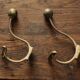 Set of 2 double coat hooks in brass