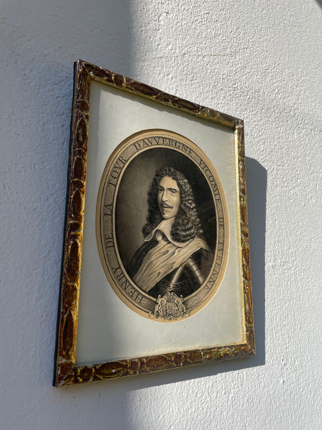 Classic antique man portrait in gilded frame