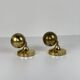 Pair of Guzzini brass spherical wall lights, 1970