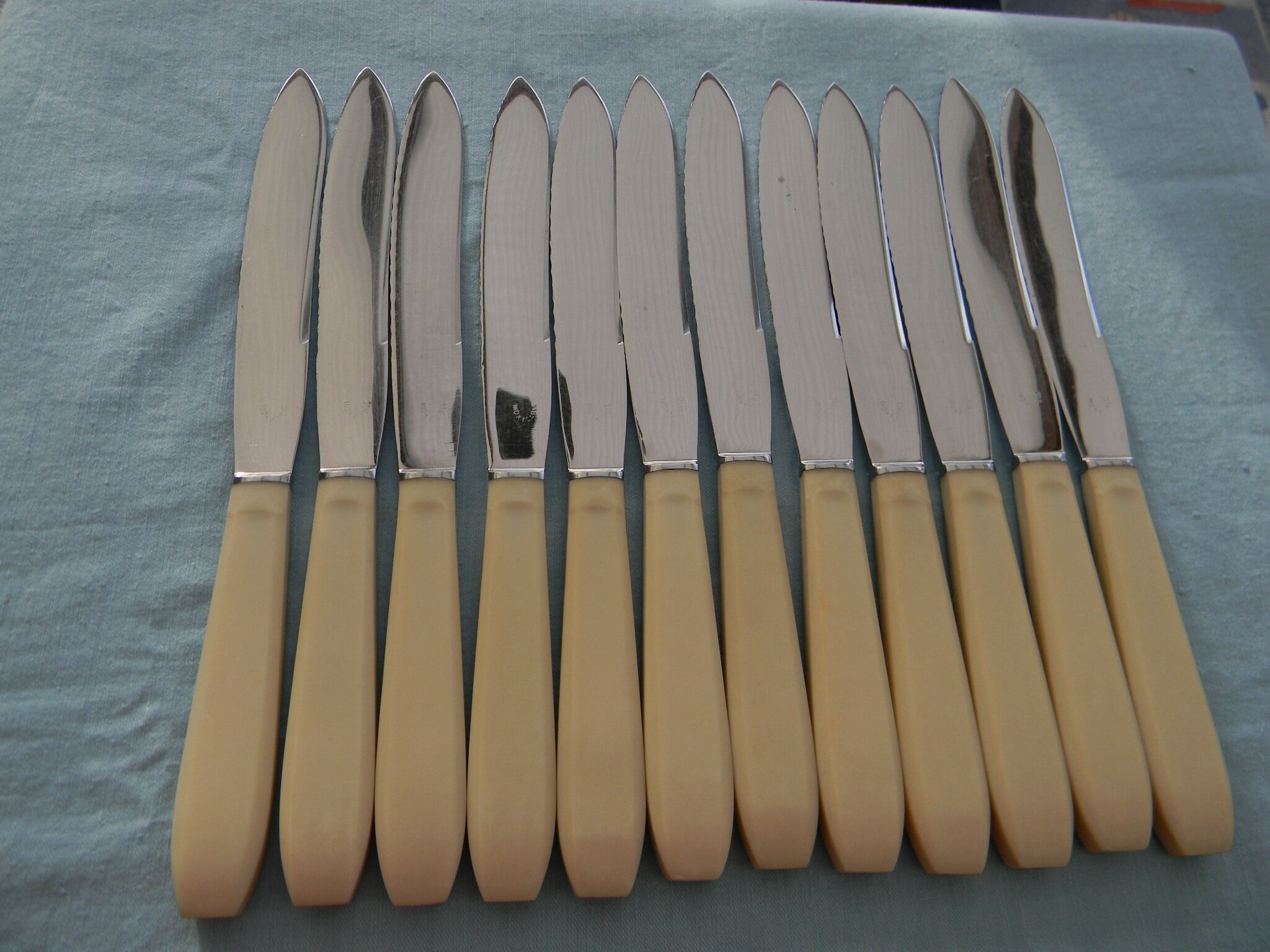 Set of 12 vintage stainless steel blade knives