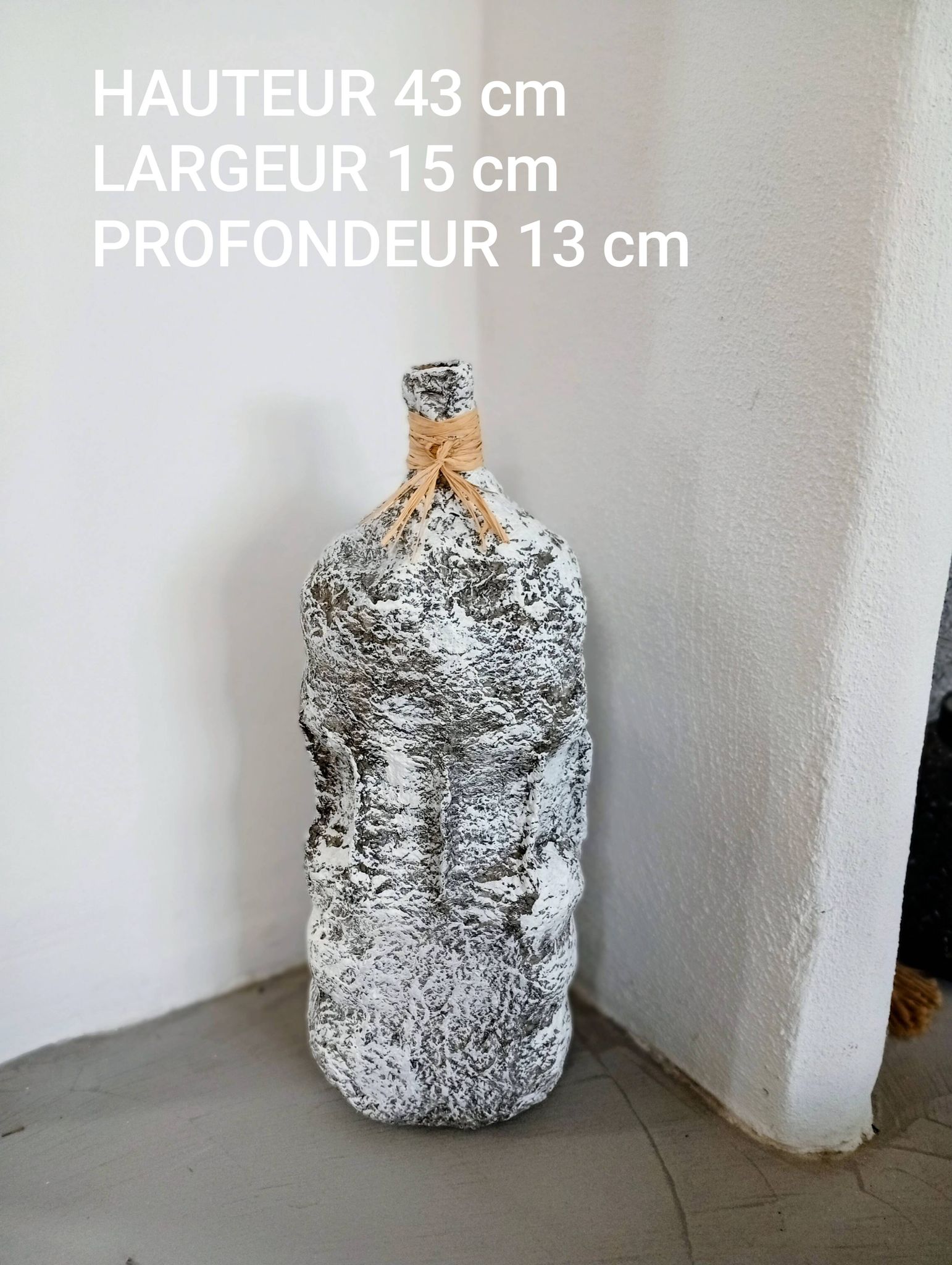 Sculptural vase with a stone effect. Wabi-sabi. Bohemian.