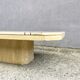 Low table in travertine and onyx 80'