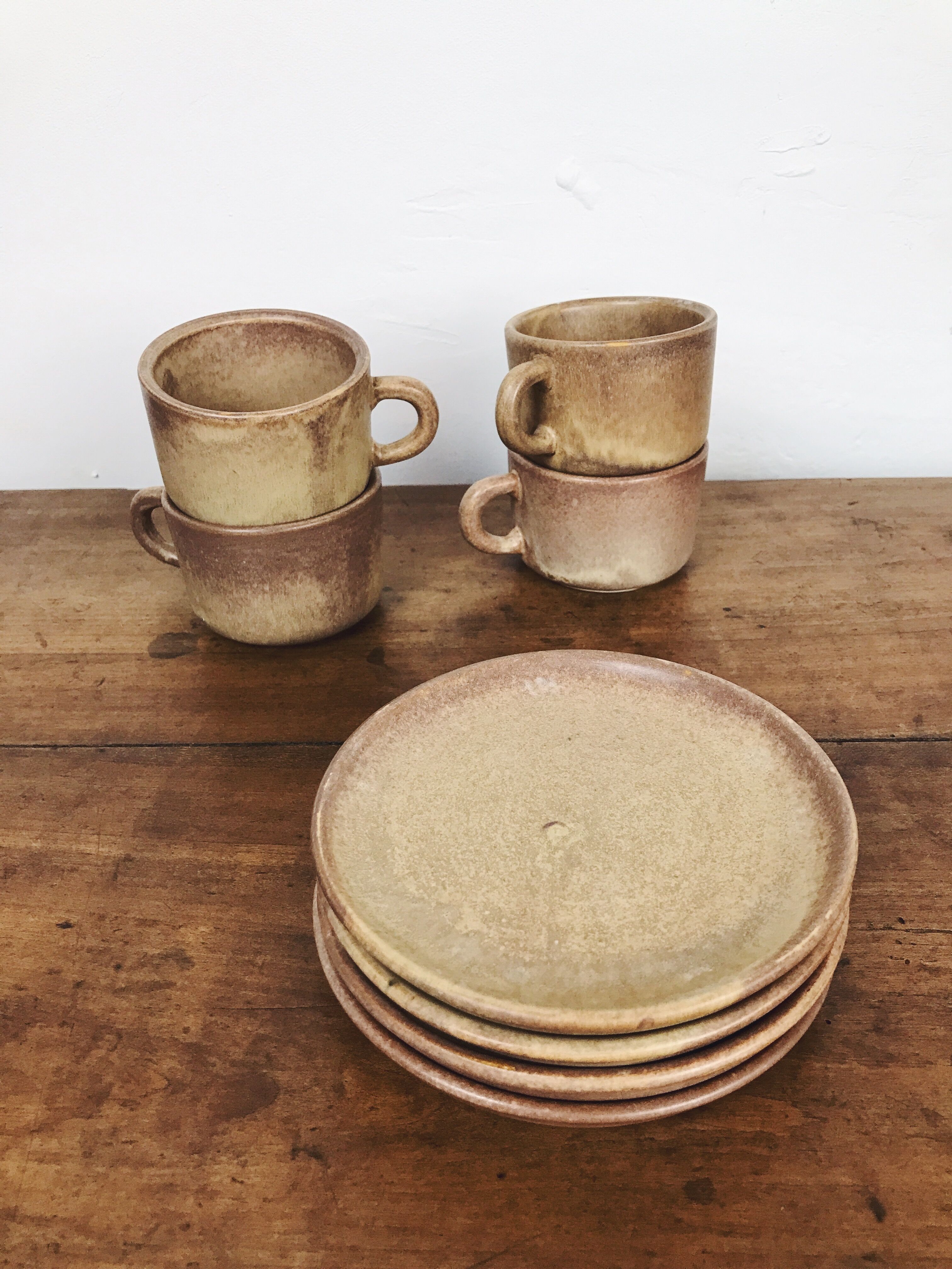 4 sandstone cups with under cups