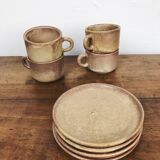 4 sandstone cups with under cups