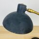 Vintage lamp from the 1950s in brass and black.