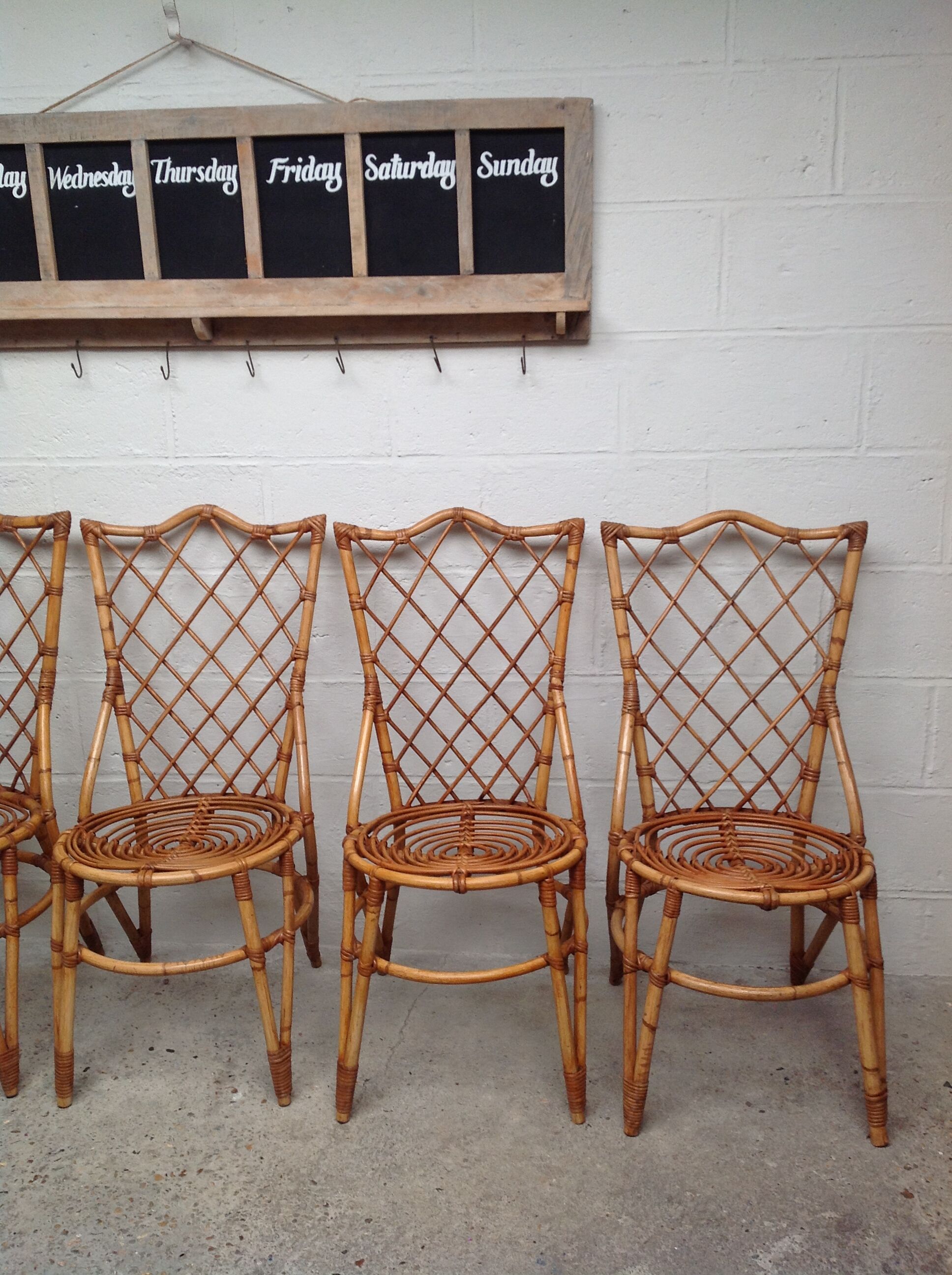 Rattan chairs by Louis Sognot