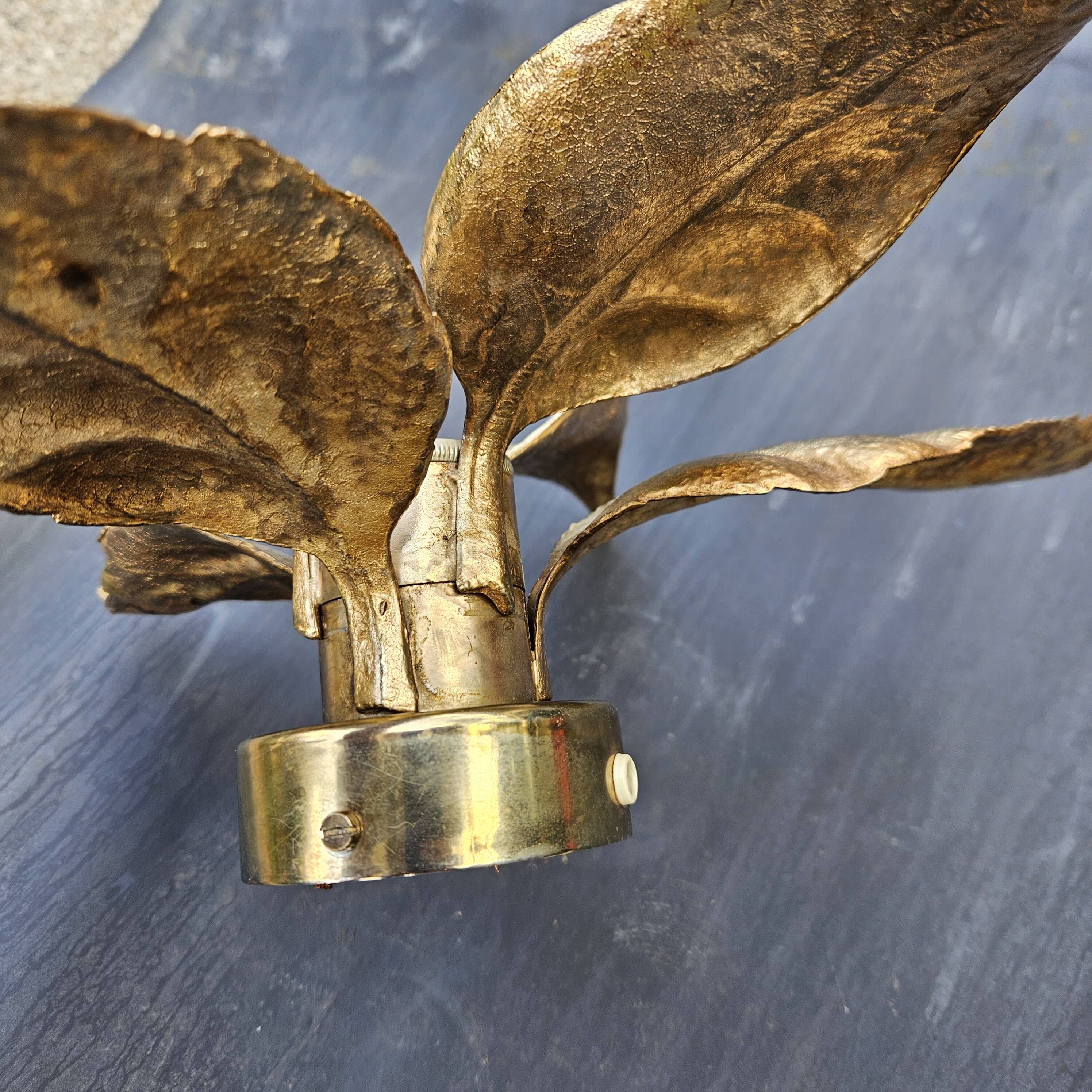 Pair of Massive wall lamps, designed by Willy Daro. 70s