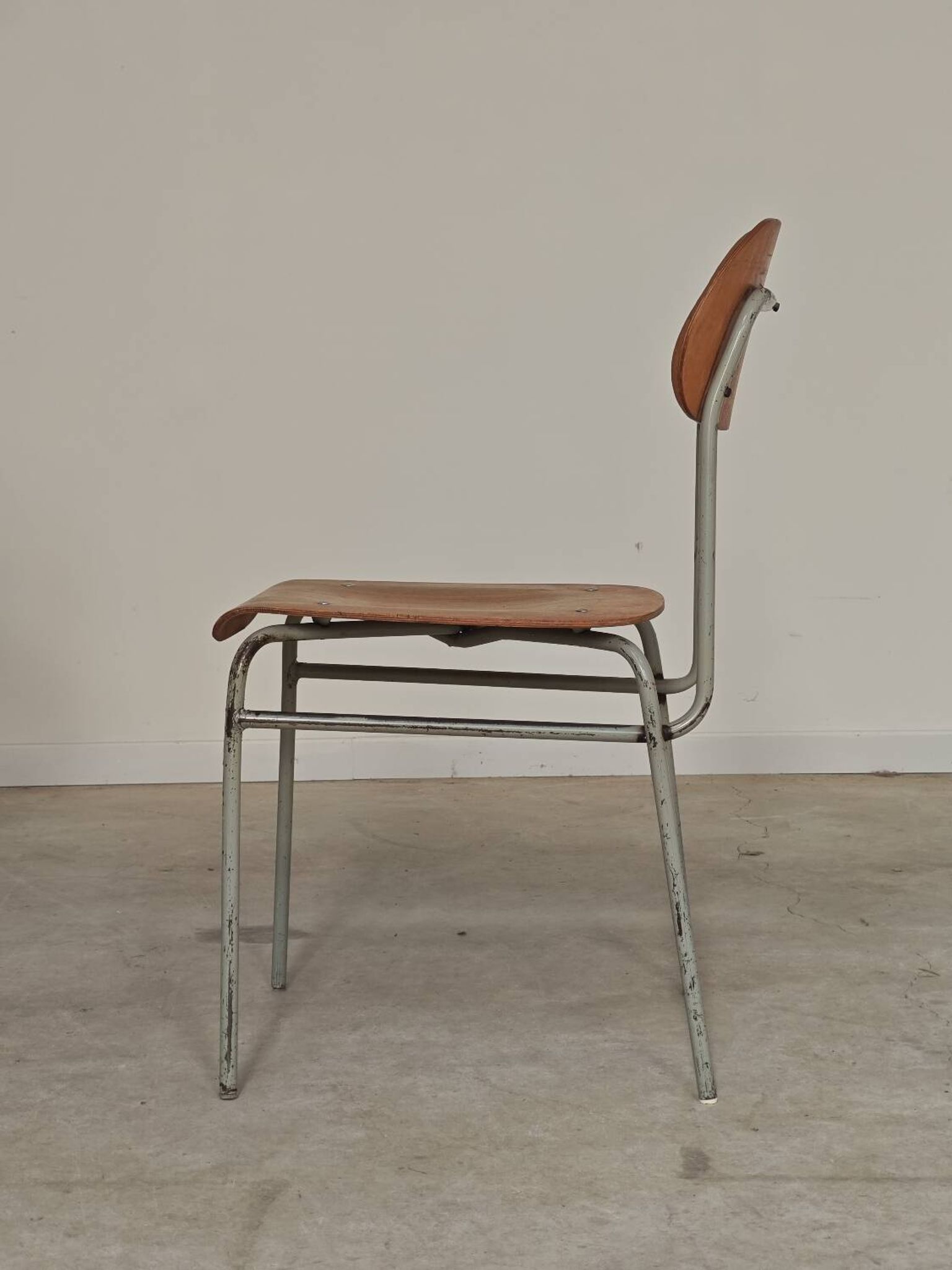 Set of 8 metal and wood school chairs  
Ex Czechoslovakia 1960