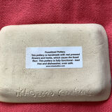 Arty enameled terracotta dish signed by the artist