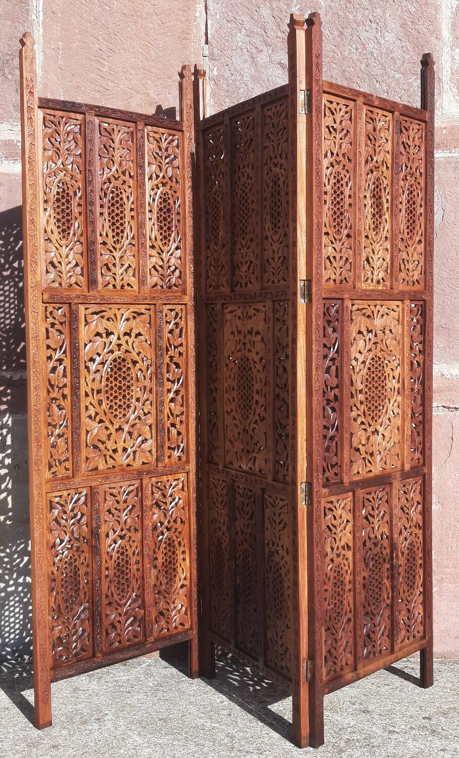 Carved solid wood screen.