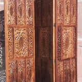 Carved solid wood screen.