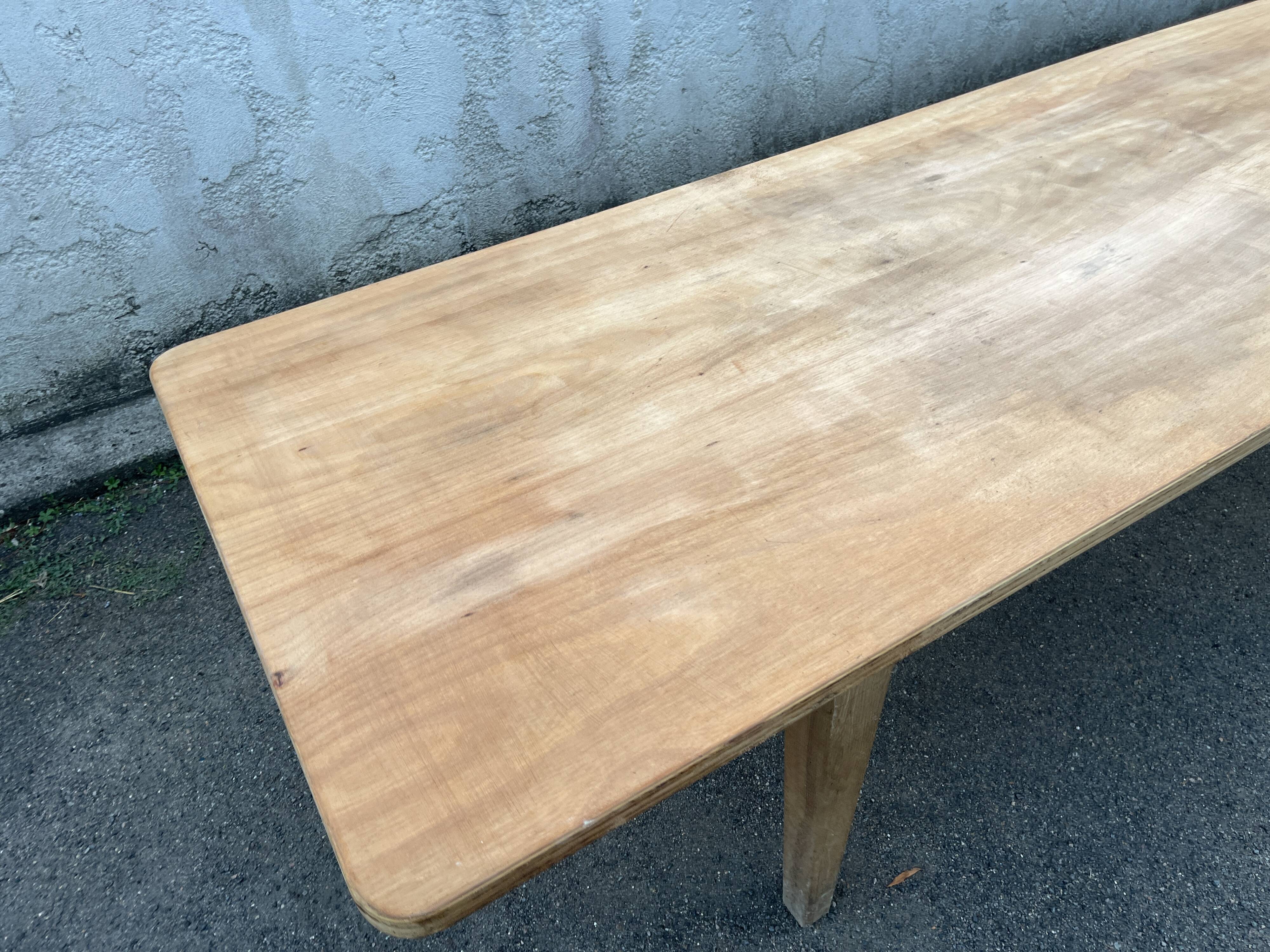 Large table 3 metres, tapered wooden legs, sanded top.
