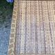 Vintage rattan chest of drawers has 3 drawers.