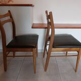 5 Scandinavian style chairs, wood and black faux leather.