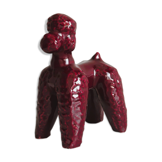 Red glazed ceramic dog.