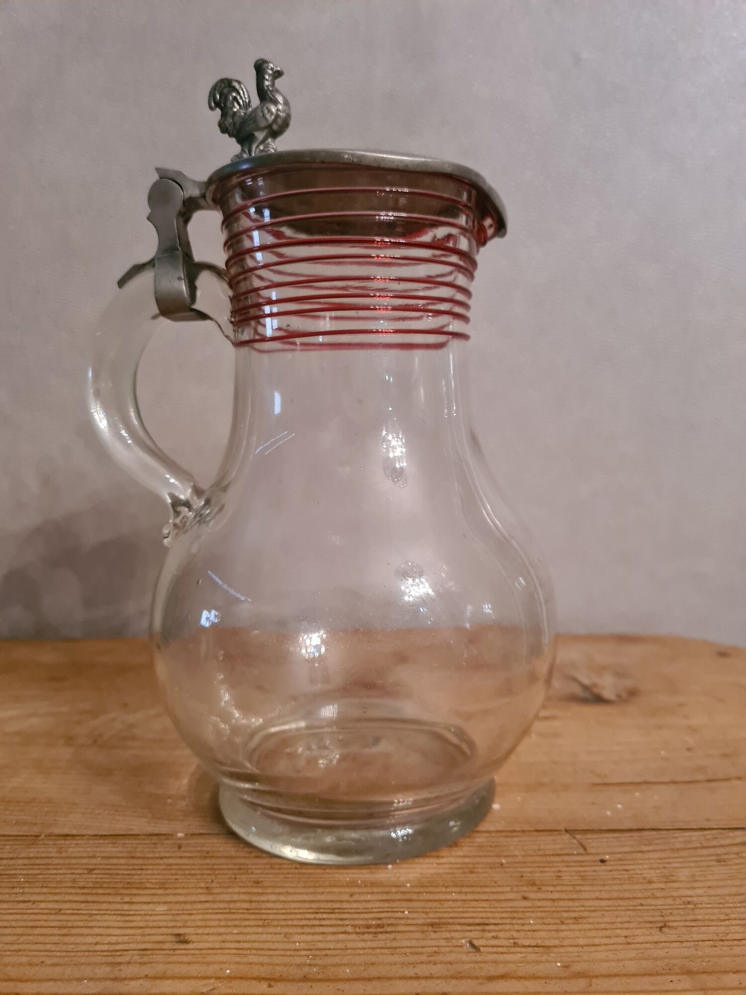 Blowing glass decanter with tin lid decorated with a rooster