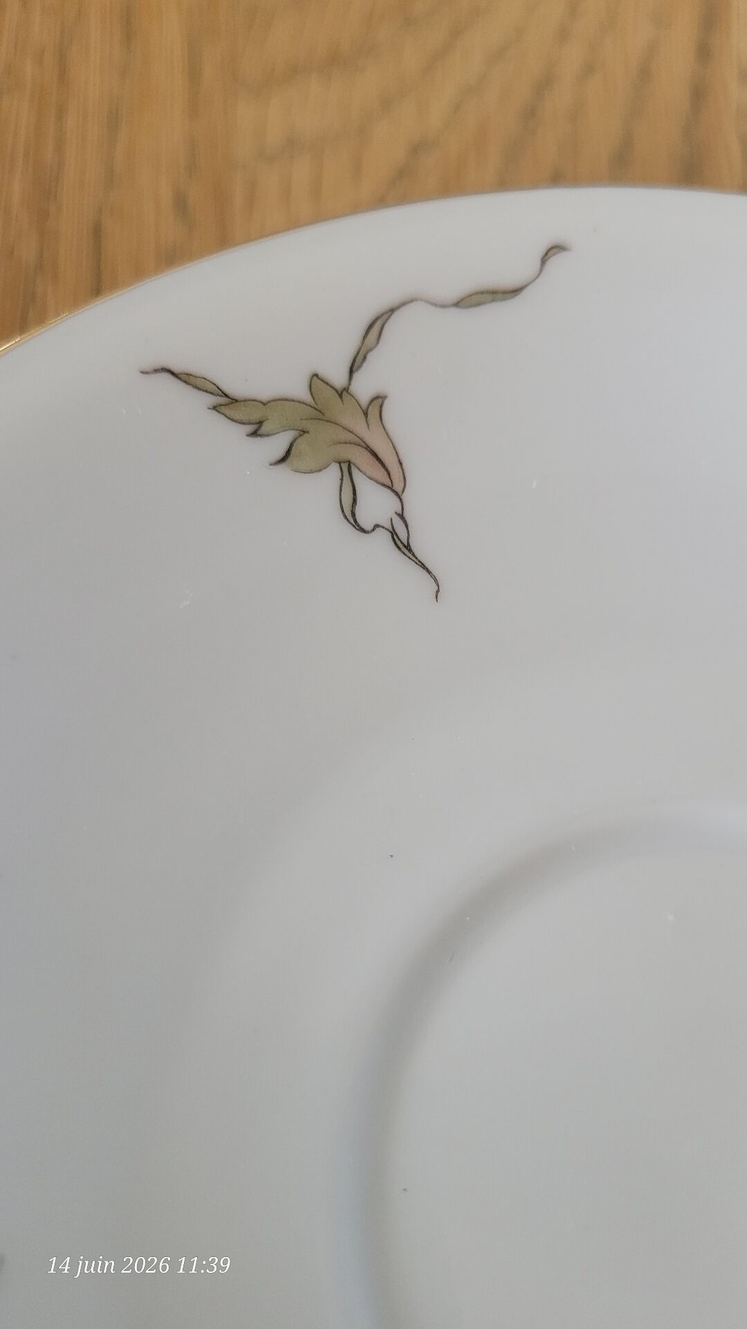 2 large antique cups and their saucers