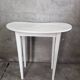 Charming white bean console