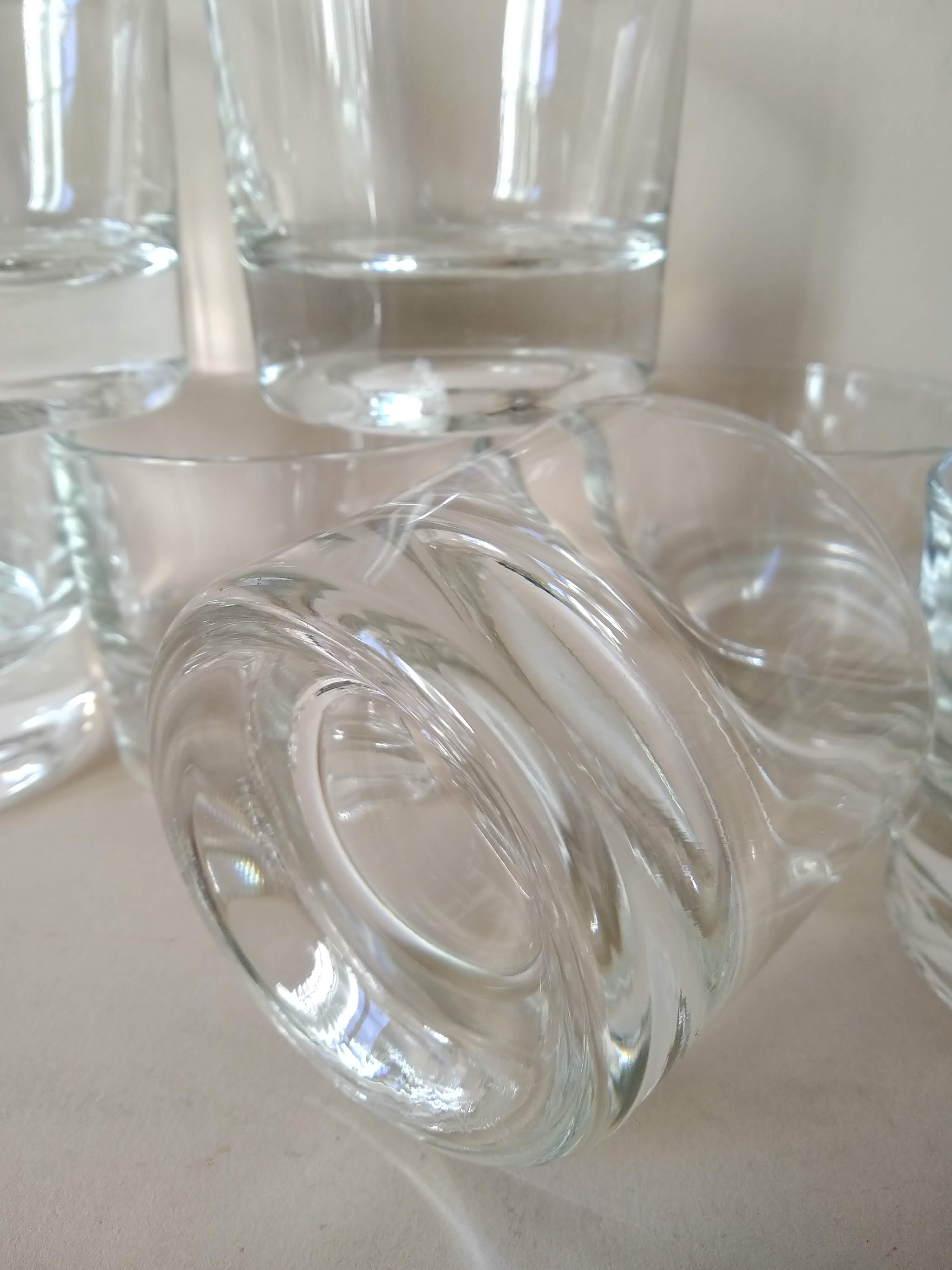Glasses cups with thick bottom with water or vintage spirits 70