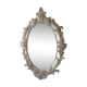 Antique oval mirror carved in wood.