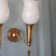 Pair of gold metal and white opaline wall sconces, wall light, sconce.