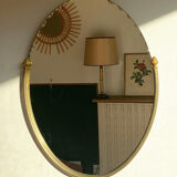 Beveled wall mirror with gold frame