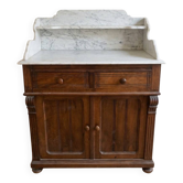 Antique wooden chest of drawers with a marble top.