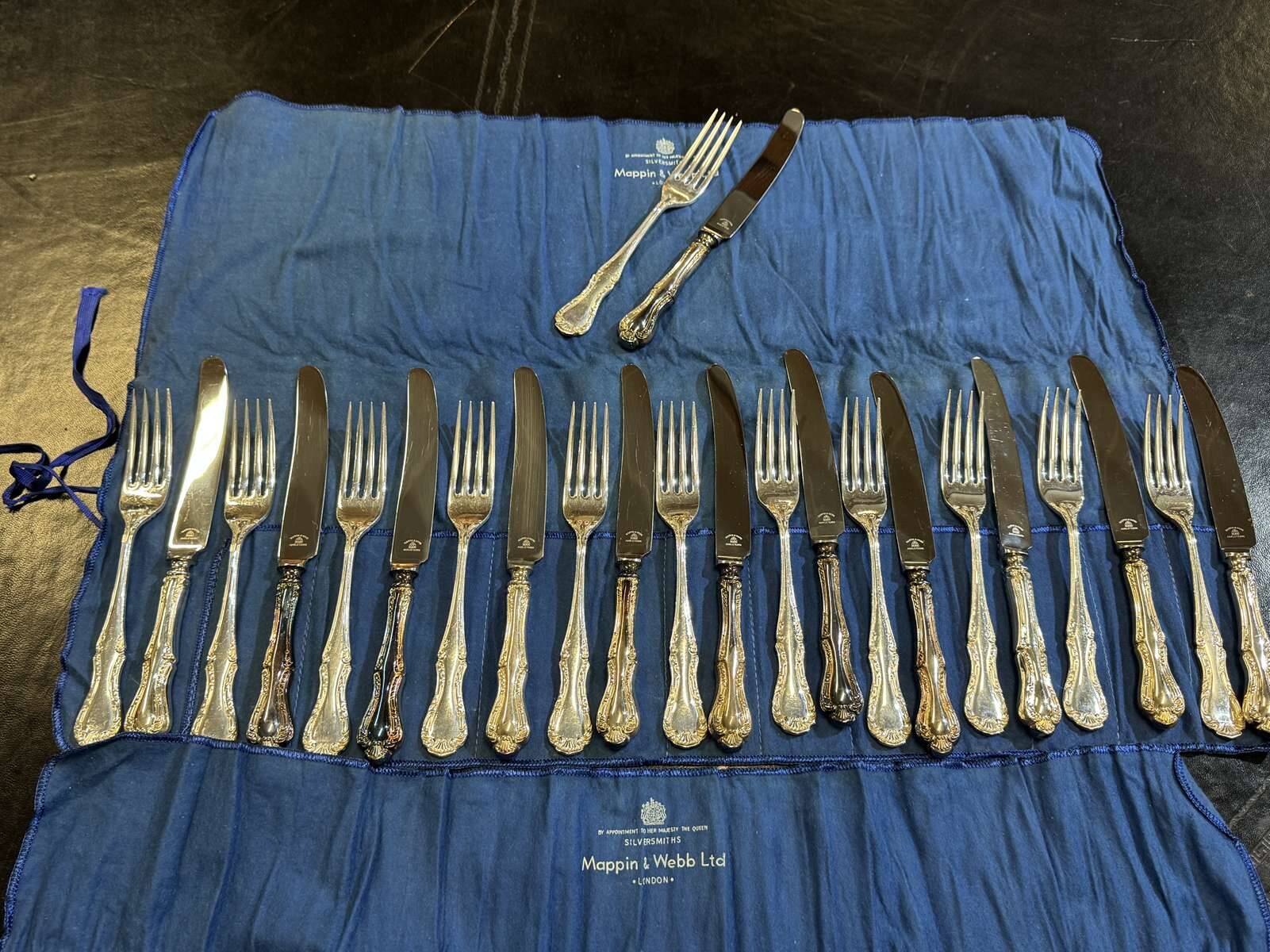 Set of 12 knives and 12 forks by Mappin and Webb in silver-plated metal.