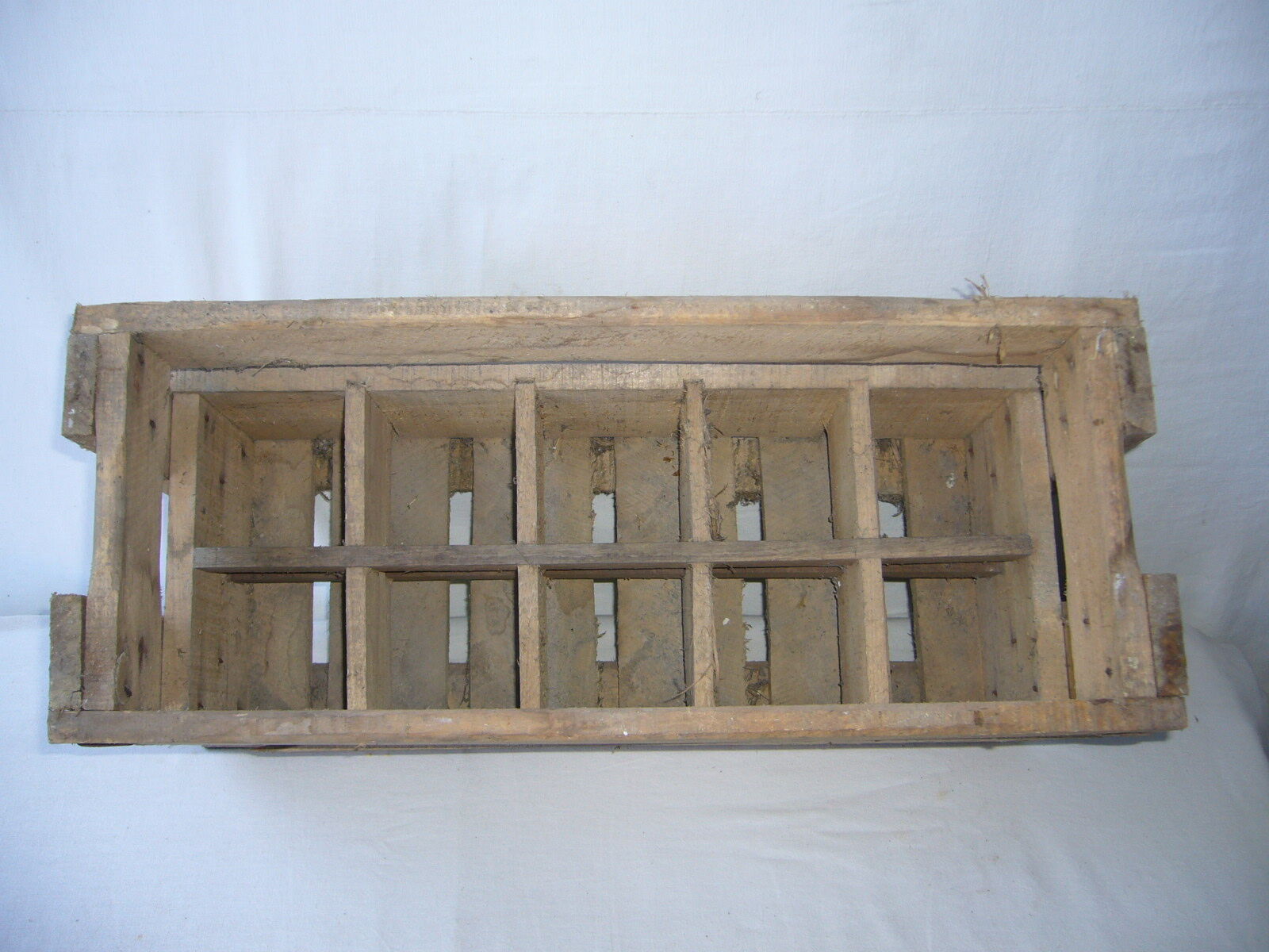 Old wooden crate for milk bottles
