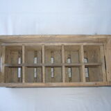 Old wooden crate for milk bottles