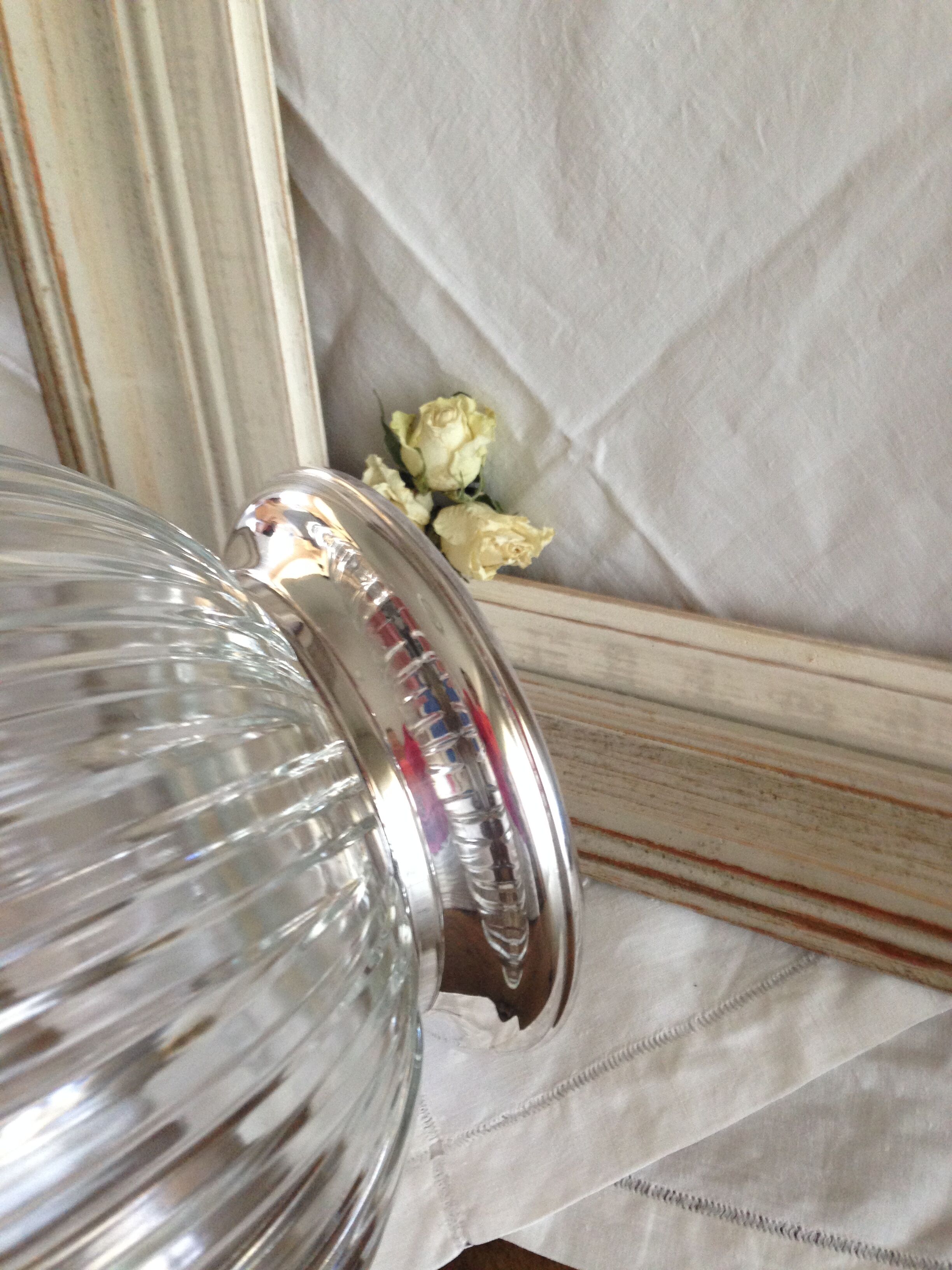 silver metal stand glass bowl