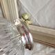 silver metal stand glass bowl