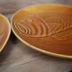 8 glazed flat plates with vintage fish decoration Saint Amand