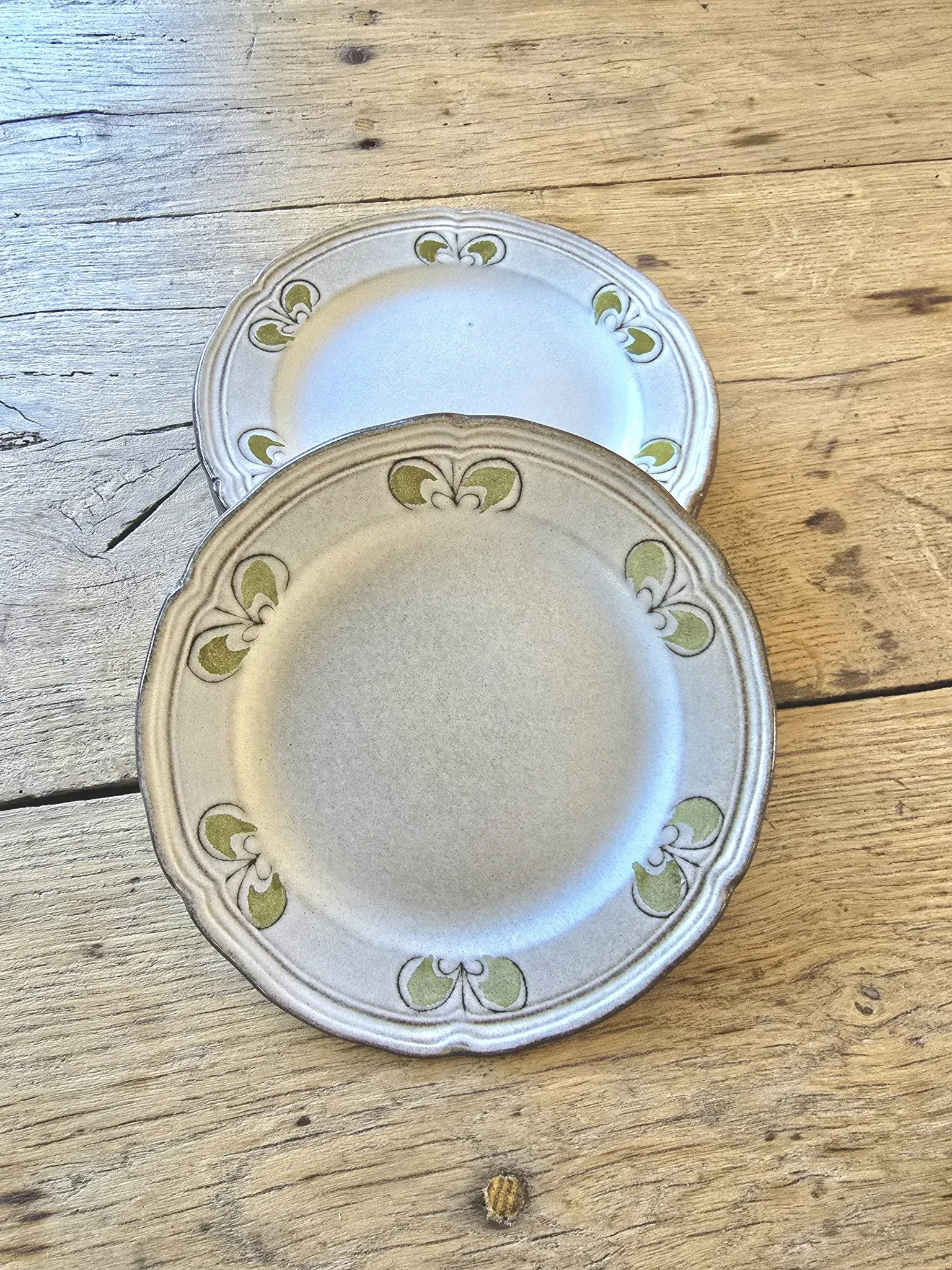 Set of 7 vintage Niderviller "Lys" painted stoneware dessert plates.