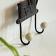 Coat rack made of steel and porcelain