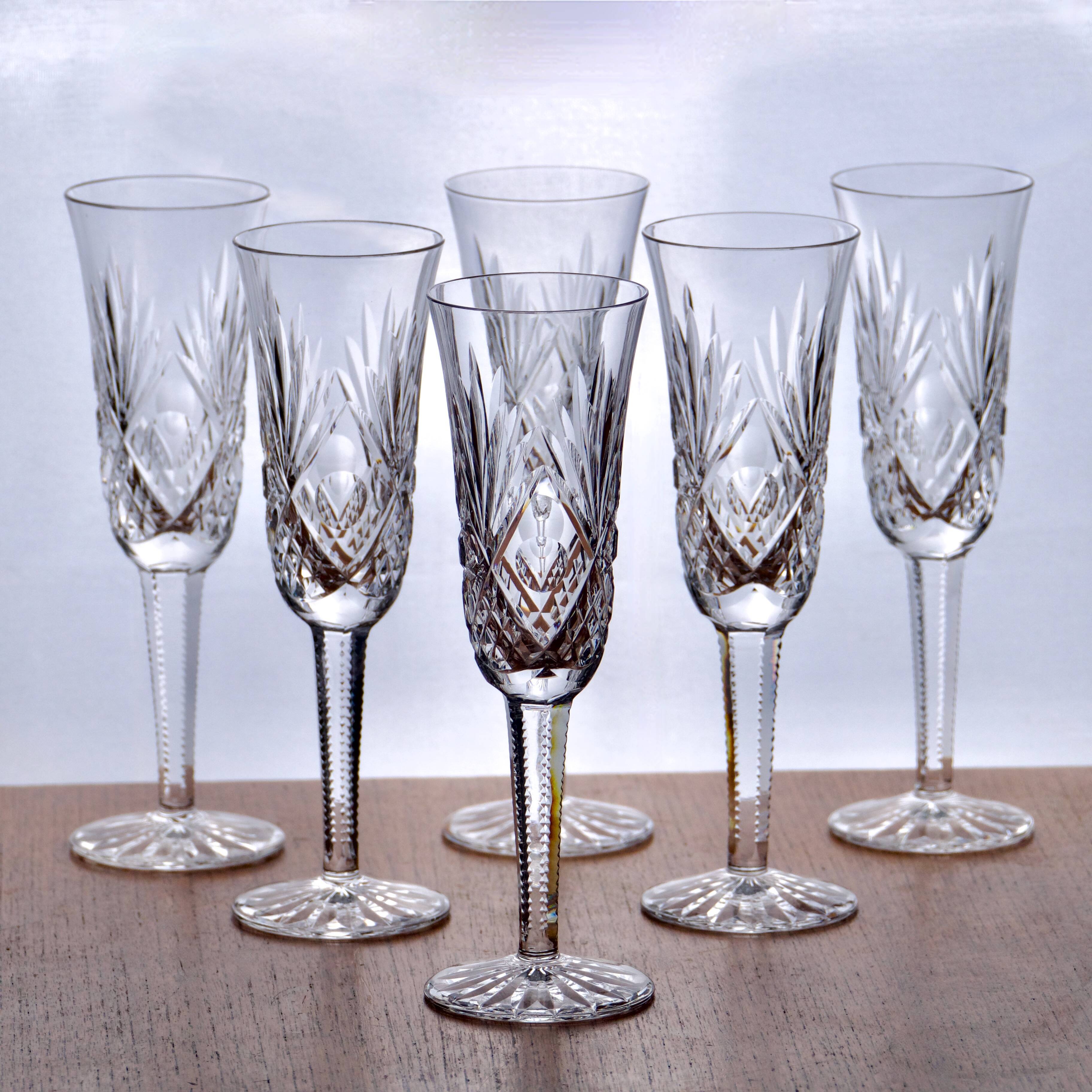 Large antique hand-cut crystal champagne flutes signed LS