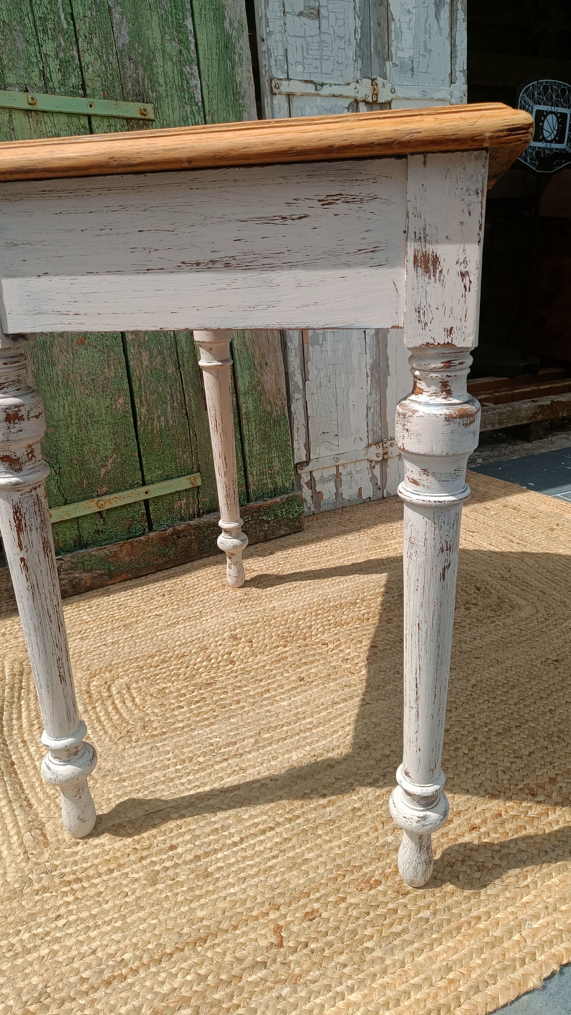 Antique drawer table with a patina.