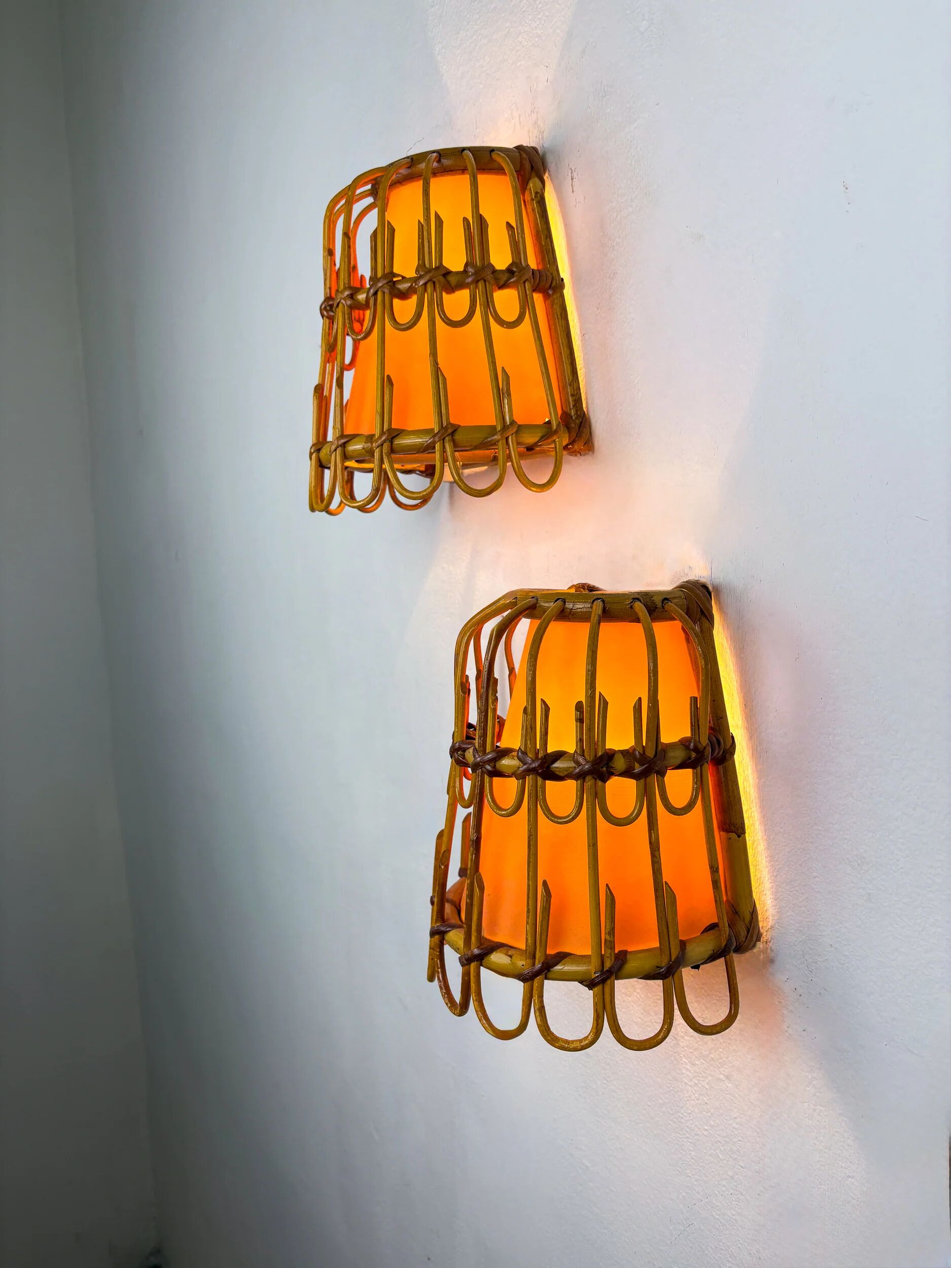 Pair of mid-century rattan wall sconces, Italy, circa 1960s