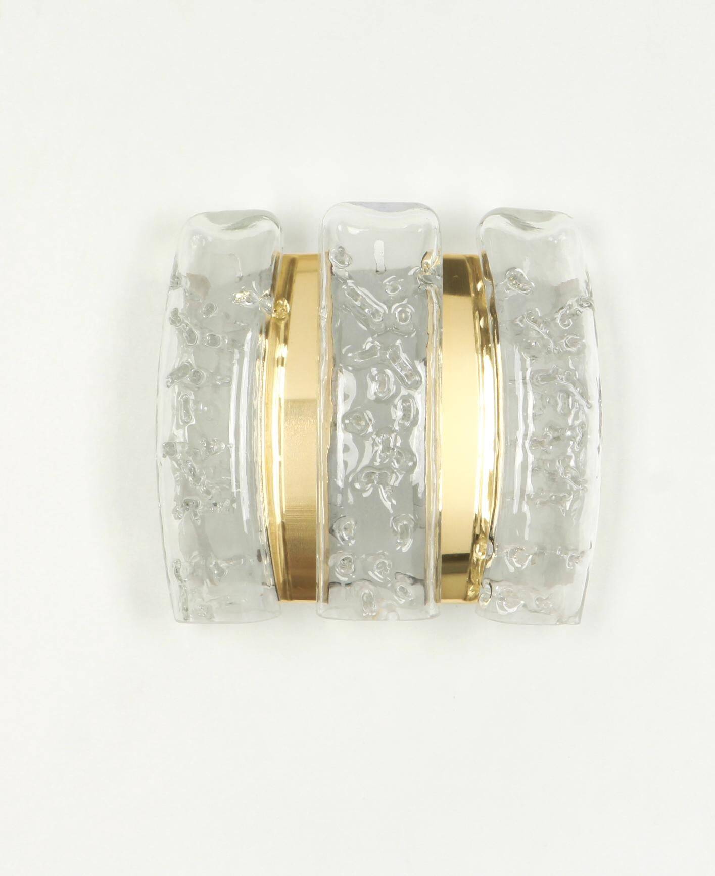 Pair of wall sconces in brass or ice glass by Doria, Germany, 1960s.