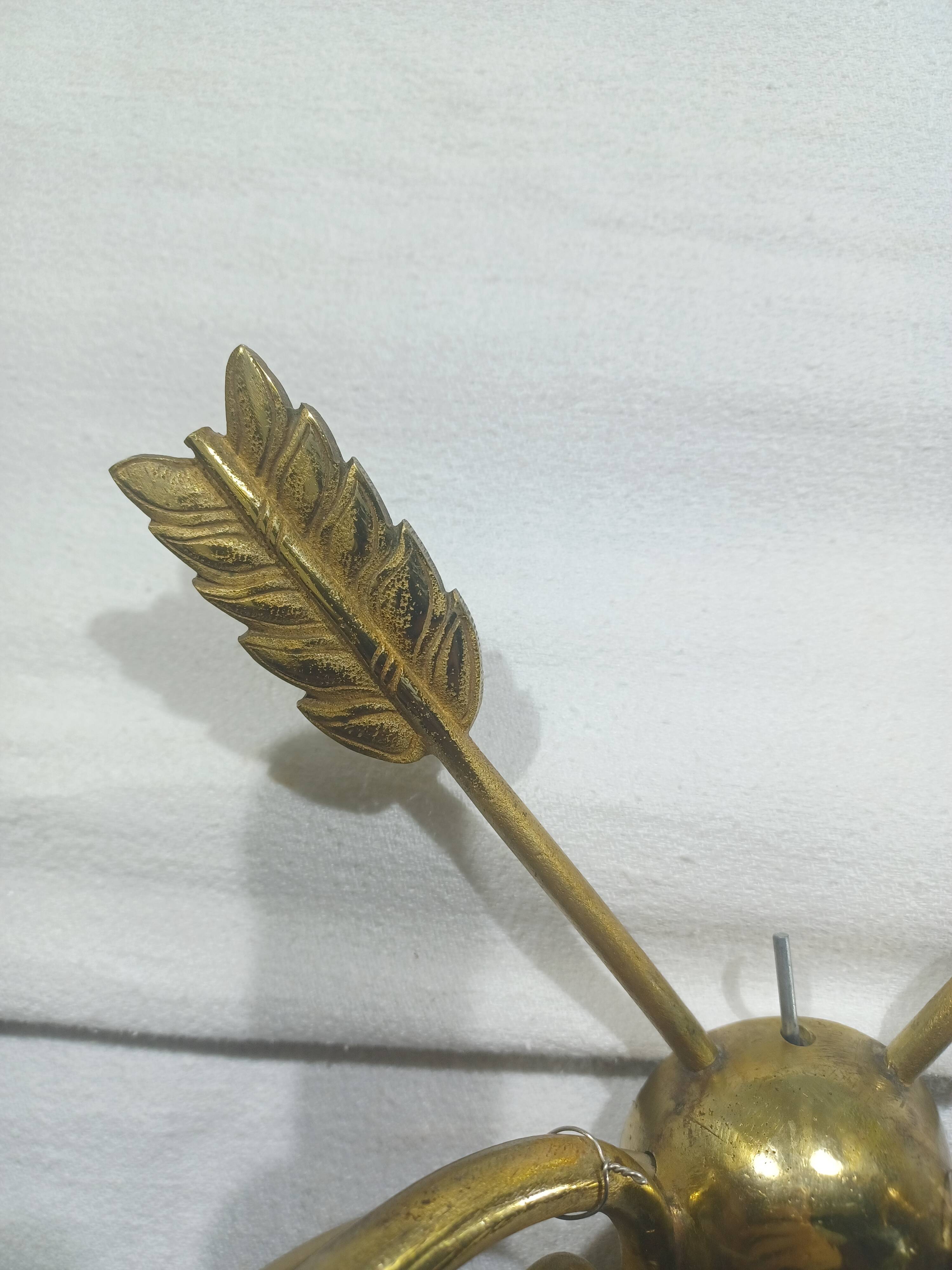 Empire style arrow wall light