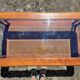 Coffee table in cherry wood, glass and caning.